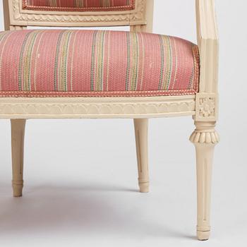 A pair of late Gustavian open armchairs by E. Öhrmark (master in Stockholm 1777-1813).