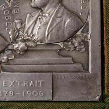 A Nobel commemorative silver plaque, marked Henri Varenne, Paris 1907.