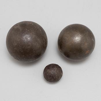 Three iron balls, 18th/19th century.