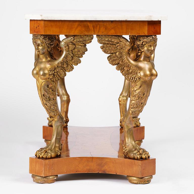 A presumably Austrian Empire centre table, early 19th century.