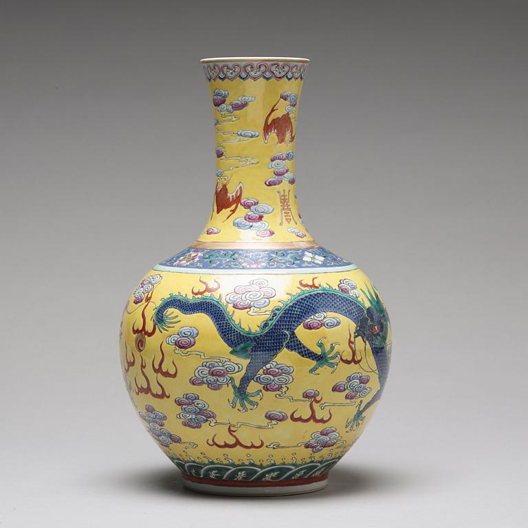 A yellow glazed five clawed dragon vase, probably late Qing dynasty with Guangxus mark.