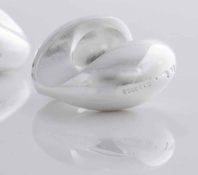 A pair of cufflink, by Ole Lynggaard.