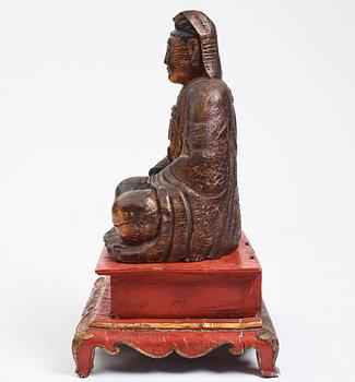 A large wooden gilt lacquer figure of Guanyin, Vietnamese/Southern China, about 1800 or later.