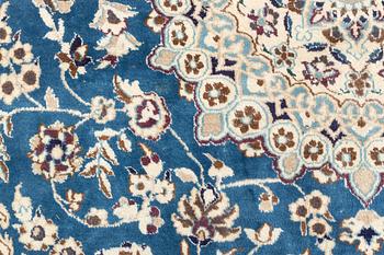 A Nain carpet, circa 310 x 196 cm.