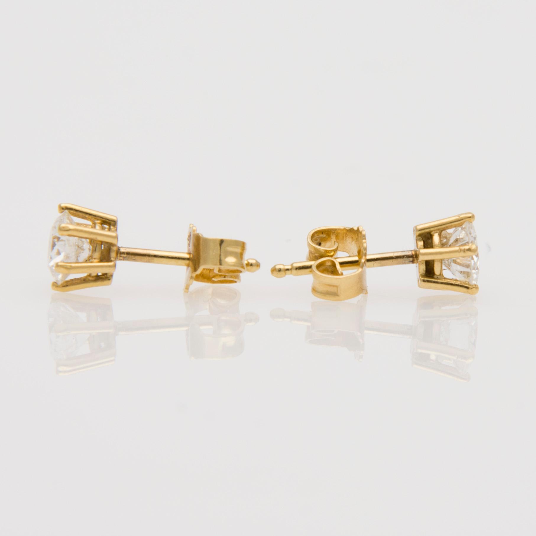 ÖRHÄNGEN, briljantslipade diamanter, 18K guld. Coster Diamonds.