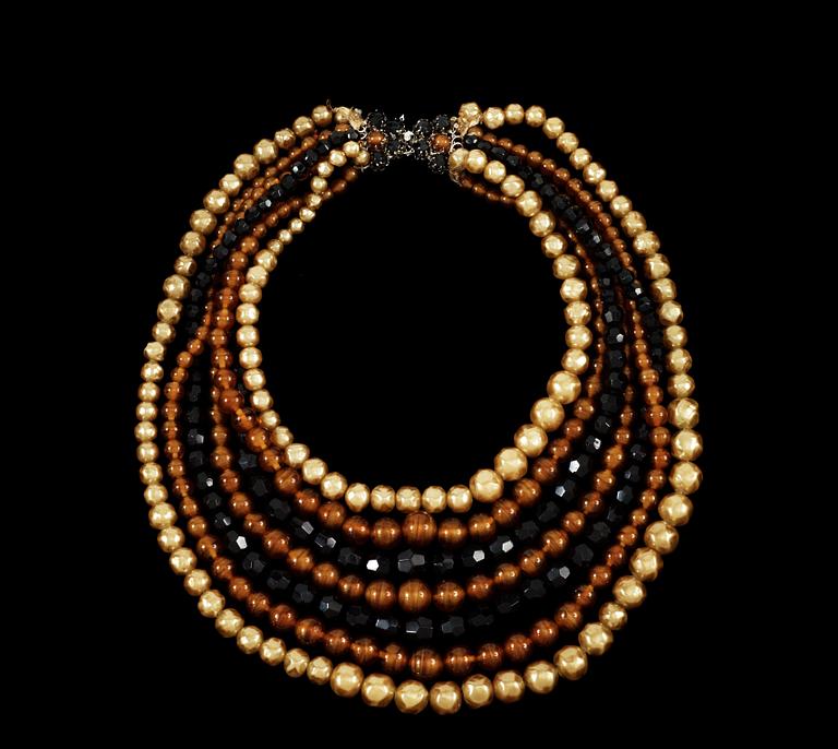 A necklace by Christian Dior.