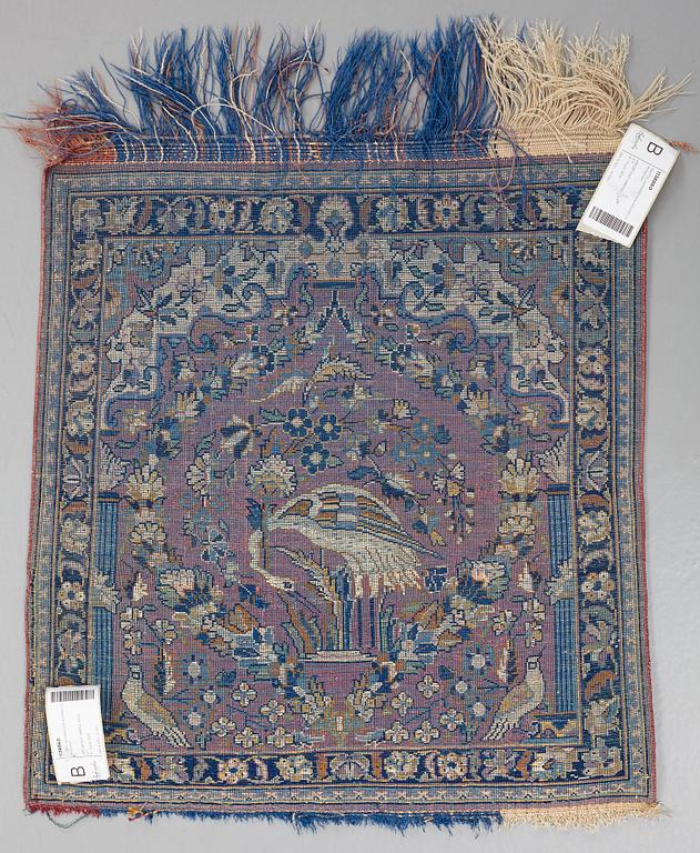 MATTO, a semi-antique silk Kashan possibly Motachem, ca 51-52,5 x 48.5-51 cm.