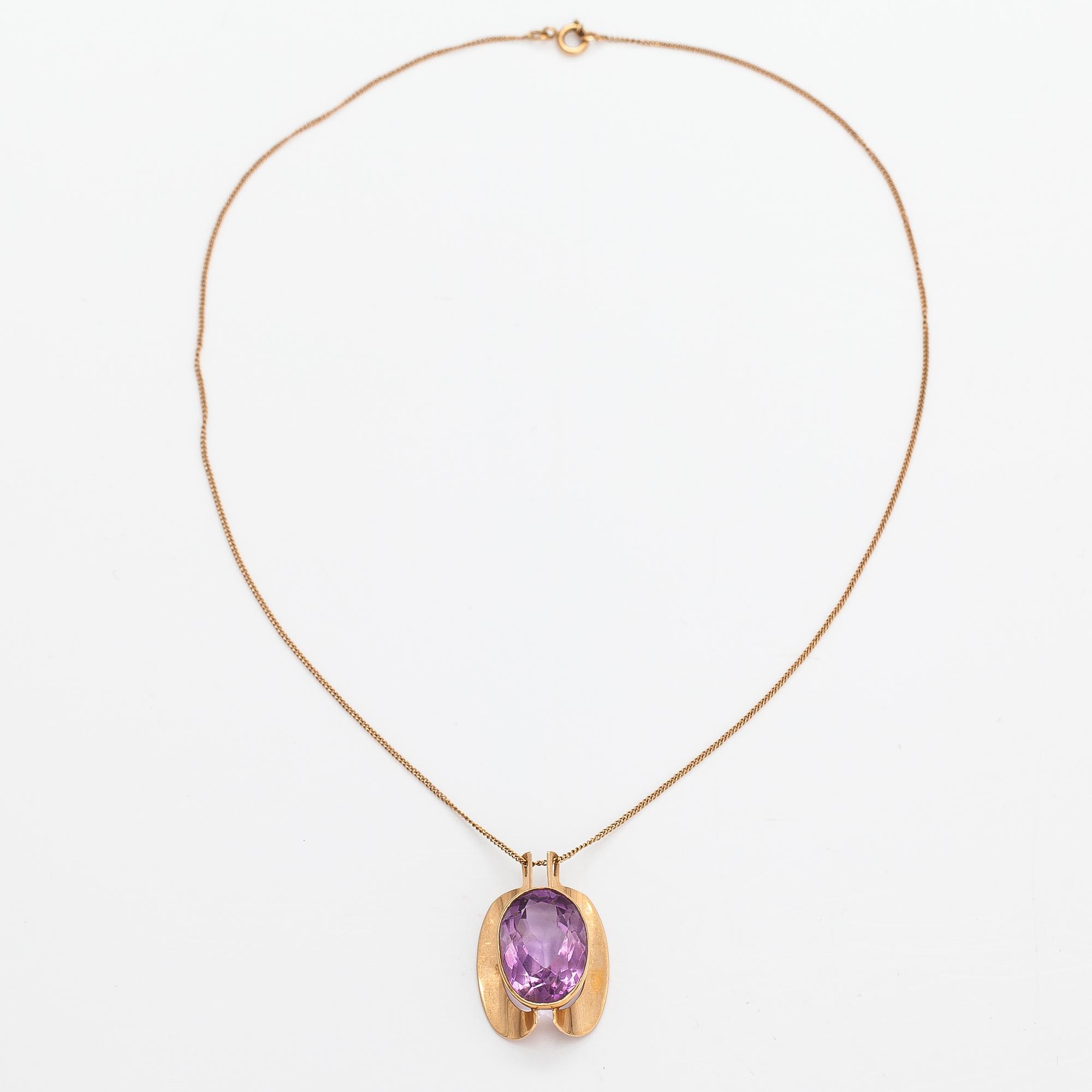 Eero Rislakki, A 14K gold necklace with an amethyst. Westerback, Helsinki 1960.
