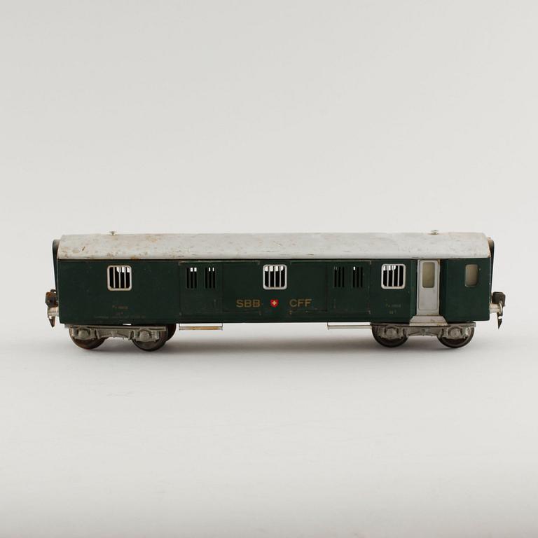 A 1940/50s model train set of 31 pcs in O-scale made by HAG, Switzerland.