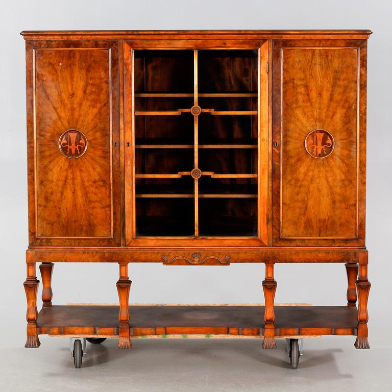A 1920/30s swedish grace cupboard, model "Sture", made by AB Seffle Möbelfabrik.