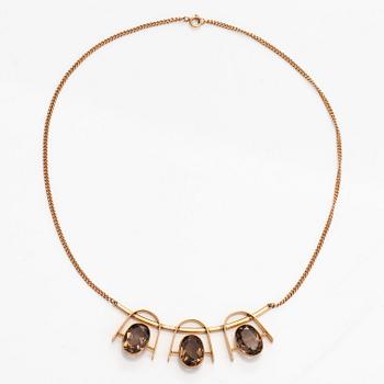 Eero Rislakki, halssmycke, fasettslipade rökkvartser, 14K guld. Westerback, 1960.