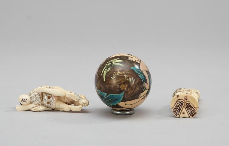 Two bone Japanese netsukes and wooden egg, 19th century.
