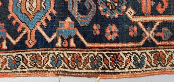 A carpet, an antique Heriz, ca 469,5-471 x 300-309,5 cm.