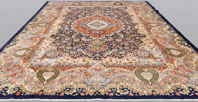 A figural Kashmar carpet, 391 x 306 cm.