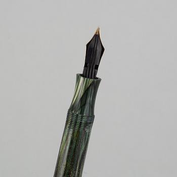 Montblanc, a fountain pen and a pencil in a leather case, 1950's.