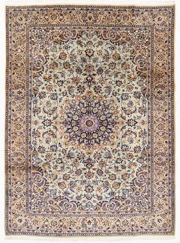 A Keshan carpet, c. 393 x 290 cm.