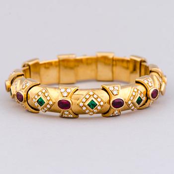 A BRACELET, facetted emeralds and rubies, brilliant cut diamonds, 18K gold.