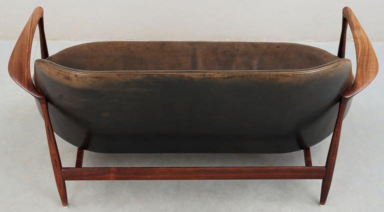 An Ib Kofod Larsen 'Elisabeth' palisander and black leather sofa, Christensen & Larsen, Denmark 1950-60's.
