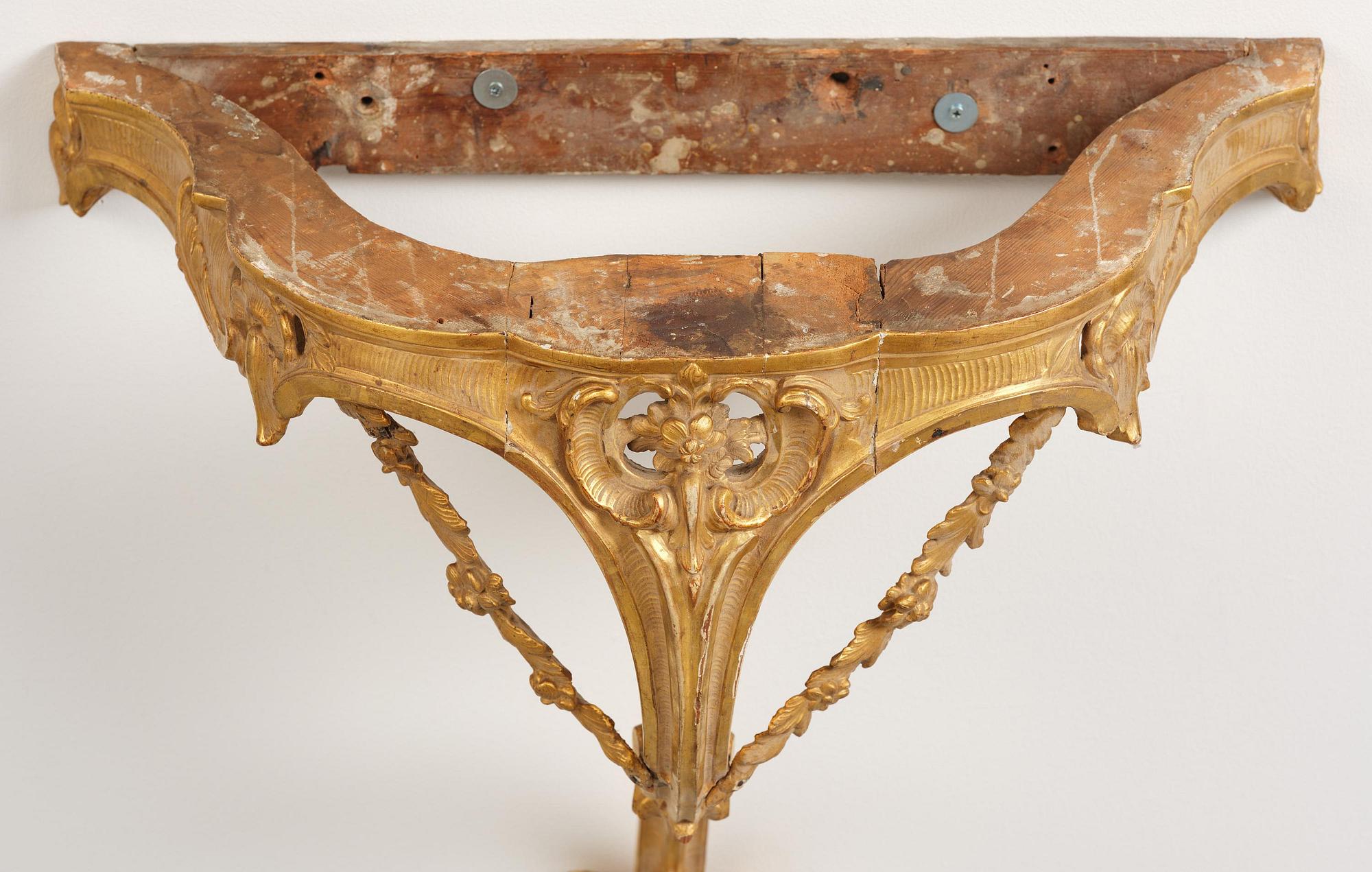 A rococo giltwood and marble console table, Stockholm, later part 18th century.