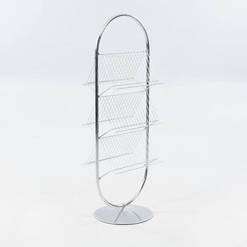 A magazine rack from the series System-1-2-3", designed by Verner Panton for Fritz Hansen around 1973.