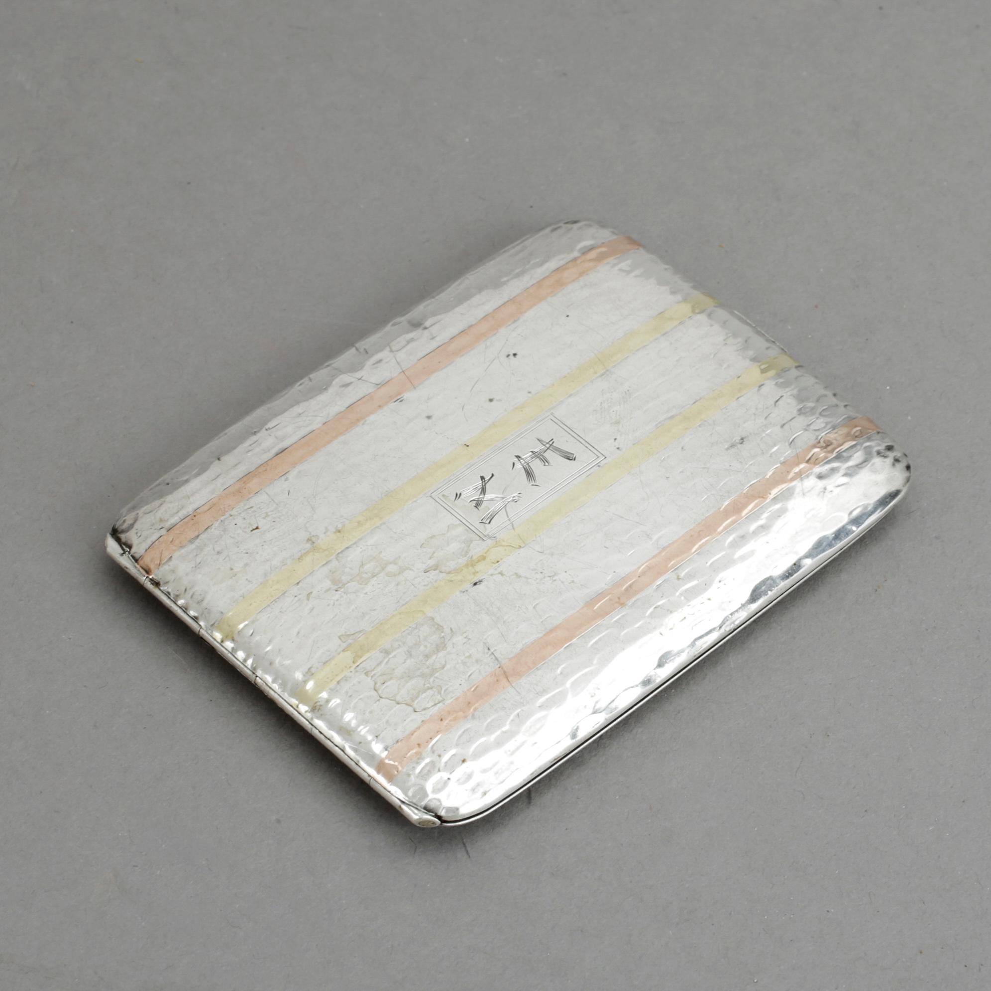 CIGARETTETUI, sterling silver och 14 k guld. Vikt 96 g.