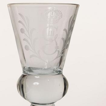 A set of 12 schnaps glasses by Reijmyre Glassworks with king Gustav III emblem.