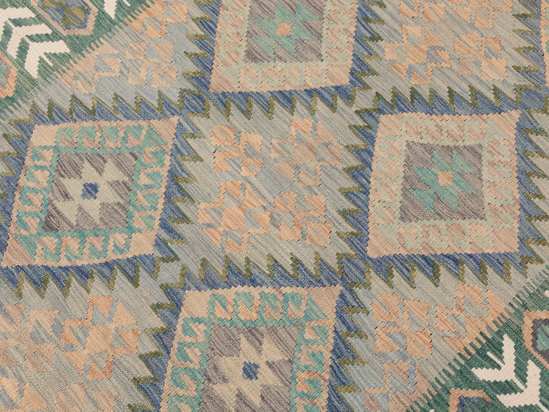 A Kilim rug, approx. 290 x 195 cm.