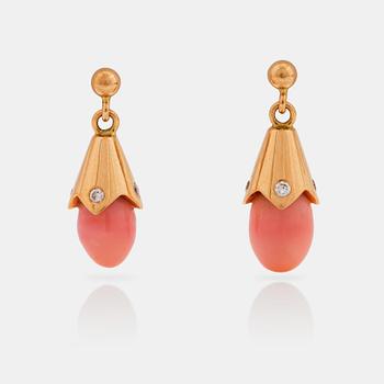 590. A pair of natural conchpearl and diamond earrings.