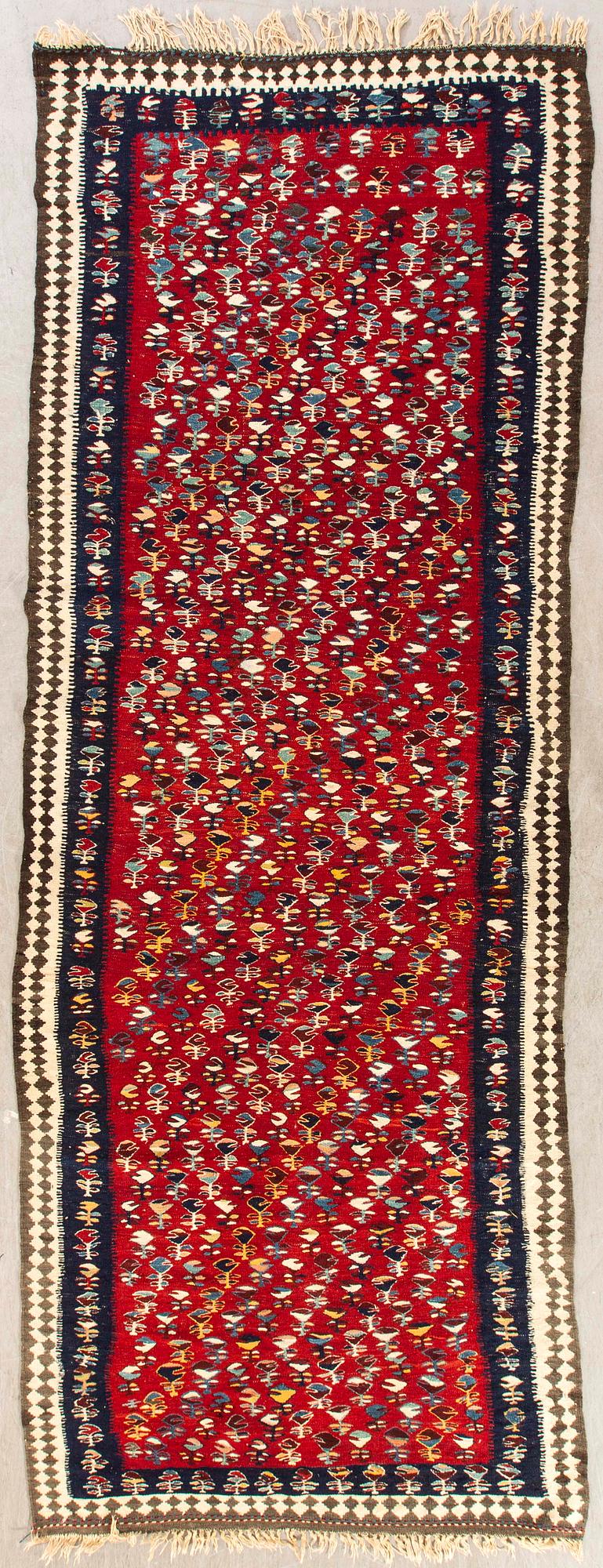 A semiantique kilim ca 353 x 128 cm.