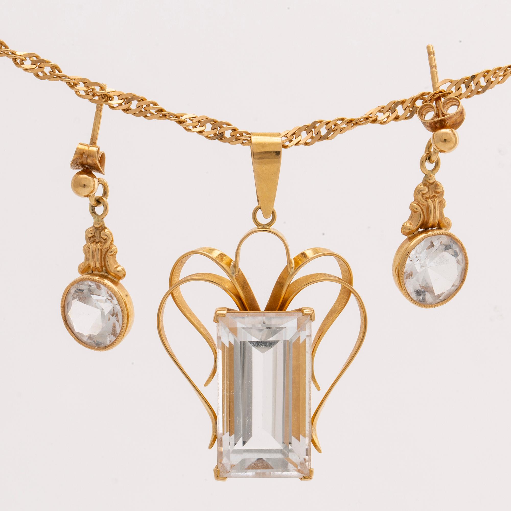 PENDANT on CHAIN and EARRINGS, 18K gold and rock crysta (pendant) and spinel (earrings), 1956.