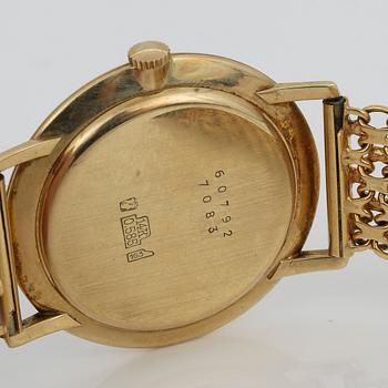 ARMBANDSUR, Precimax, med boett i 14K guld samt armband i 18K guld, stampläd Stockholm, 1963. Total vikt ca 47,4 g.