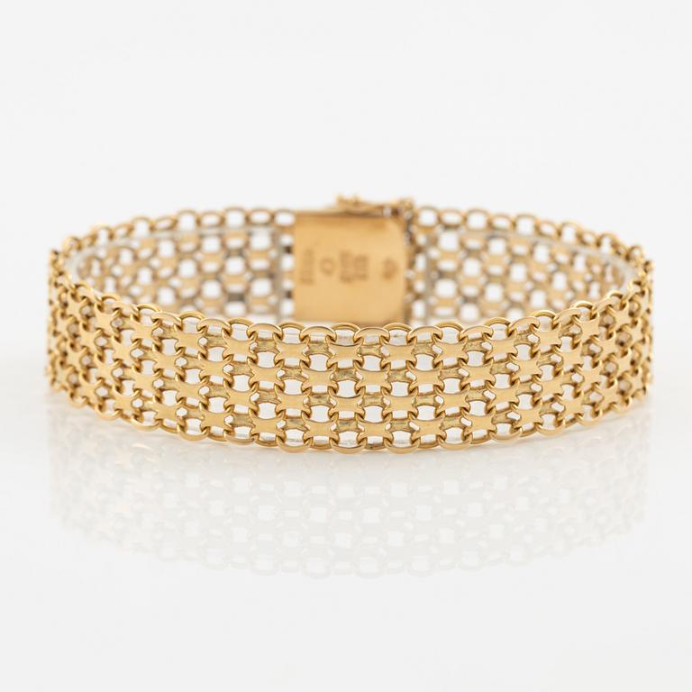 Arm bracelet, 18K gold, x-link.