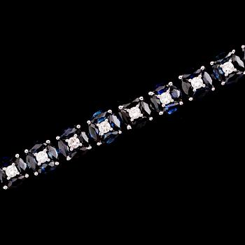 ARMBAND, 18 k vitguld, briljantslipade diamanter tot ca 1.21 ct, navettslipade safirer tot ca 11.16 ct.