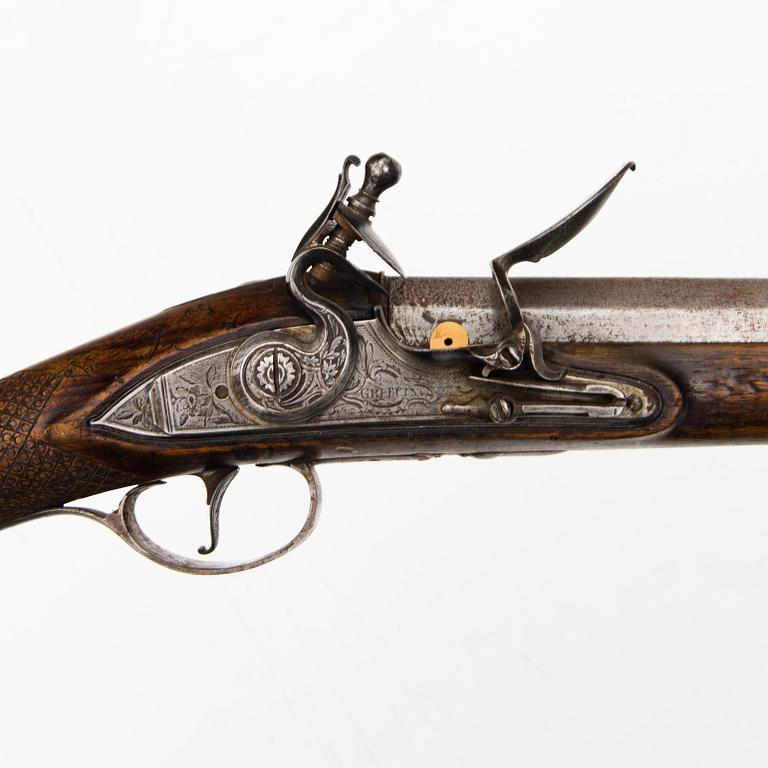 A Flintlock rifle by Joseph Griffin, London, second half of 18th Century.