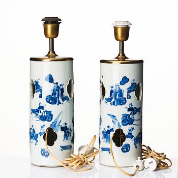 A pair of blue and white vases made in to lamps, late Qing dynasty, 19th Century.