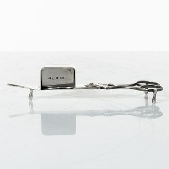 A Swedish Empire silver candle snuffer and tray, Stockholm 1818-1819.