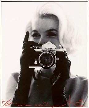 240. Bert Stern, "Marilyn Monroe with Nikon Camera".