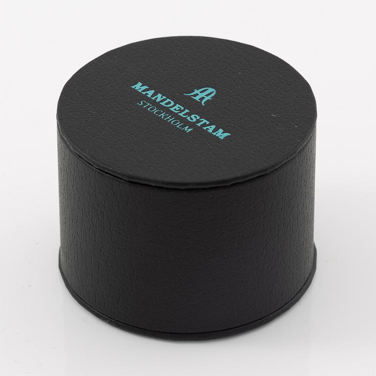 Ring, Mandelstam, 18K gold with cabochon-cut rubelite (tourmaline) and brilliant-cut diamonds and tourmalines.