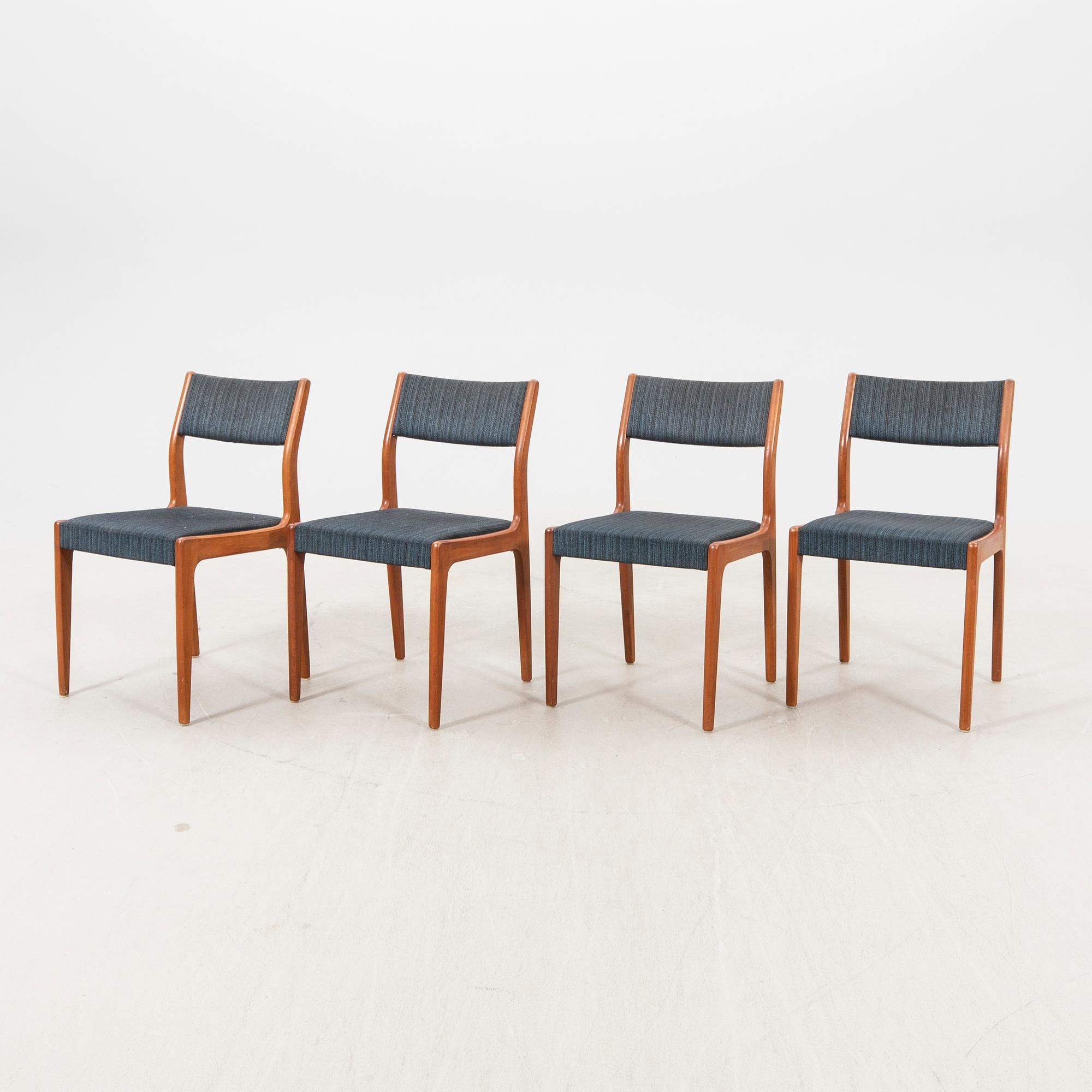 A set of four 1960s teak chairs.