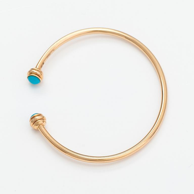 Piaget, A "Possession" bracelet made of 18K gold with turquoises. Marked Piaget R58367, 15.