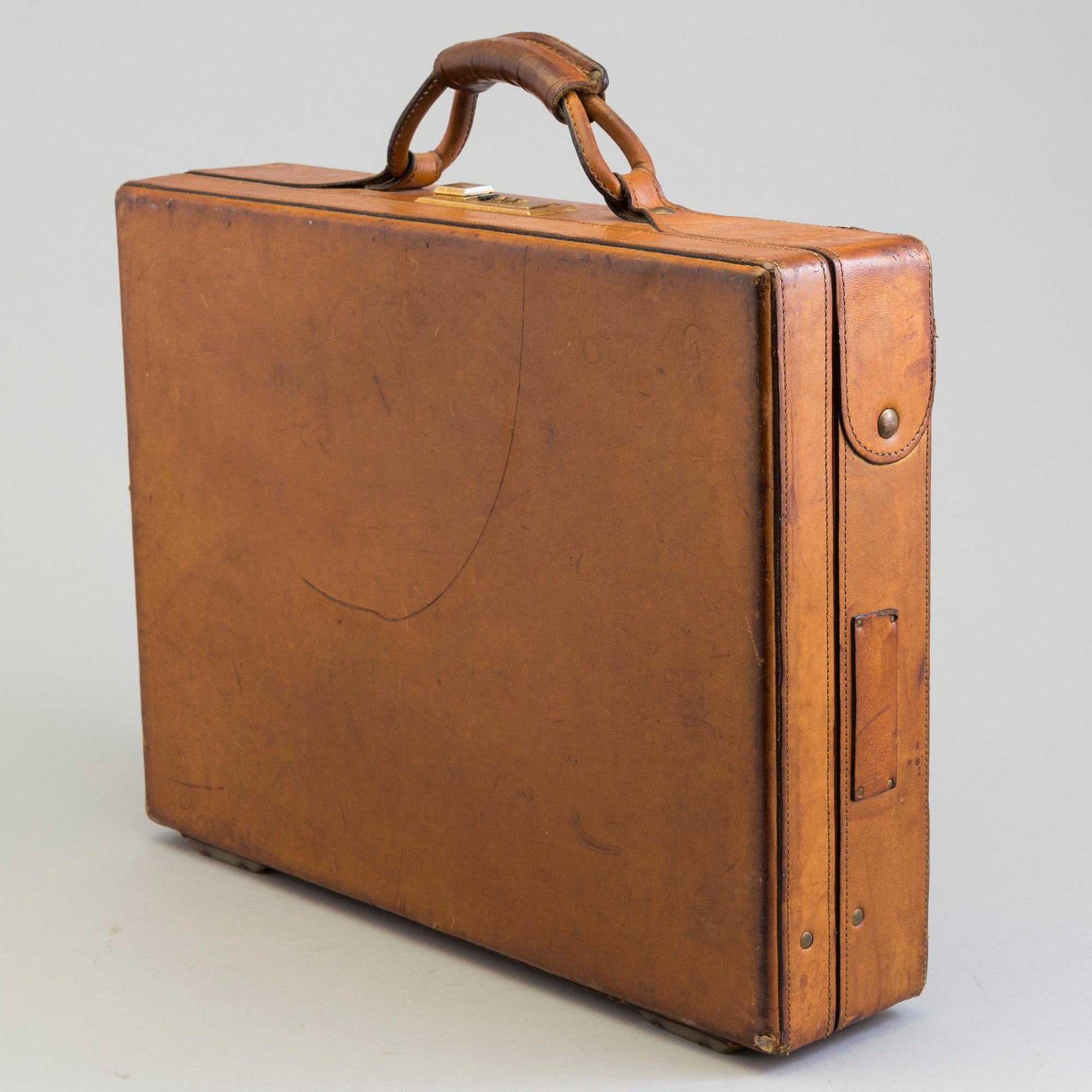 A leather brifcase, Hartman.