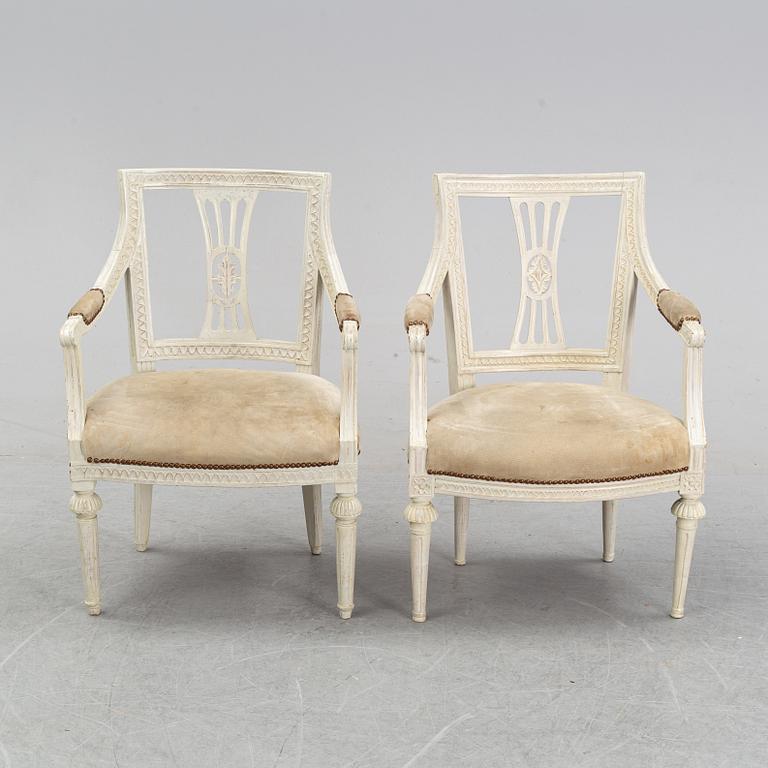 A set of two Gustavian arm chairs from the early 19th Century.