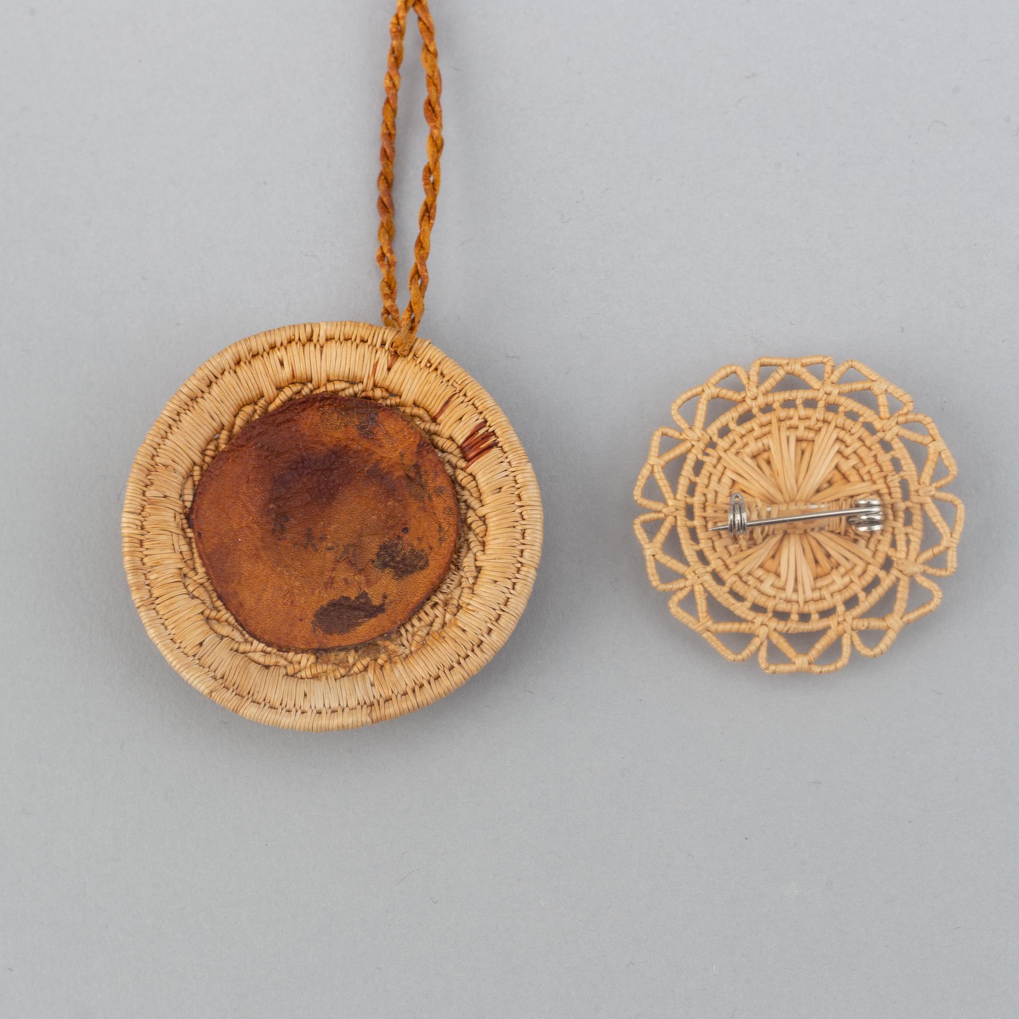 A Sami root brooch and pendant.