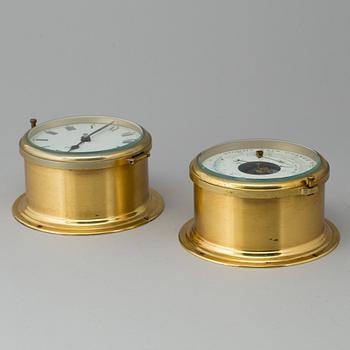 A brass barometer and clock, Schatz, 20th century.