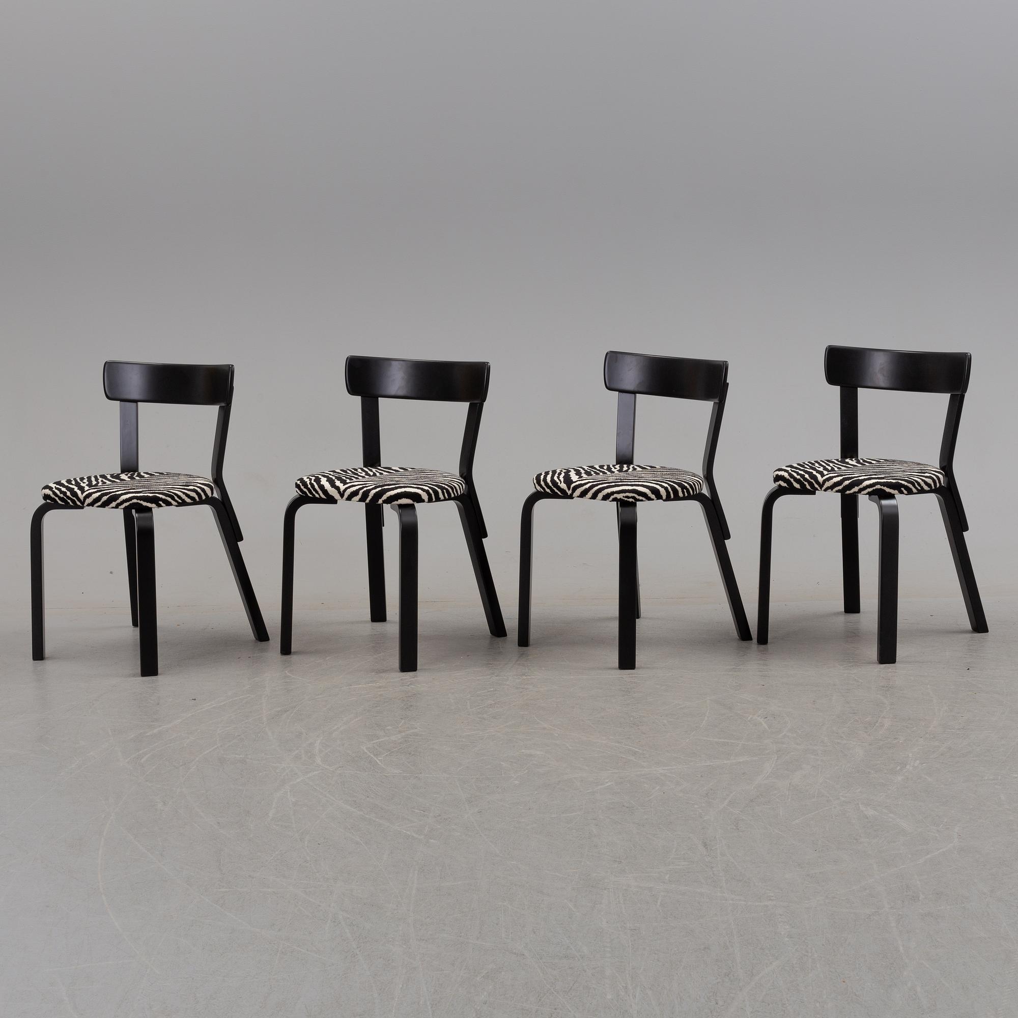 a dining table '81B' and four '69' chairs by Alvar Aalto, Artek.