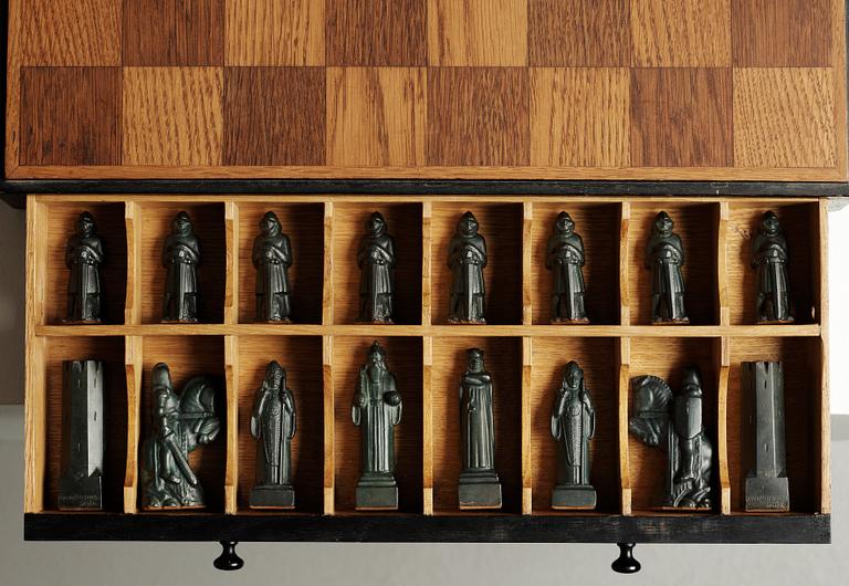 A set of 32 Tore Strindberg chess pieces, executed by Herman Bergman foundry, Stockholm.