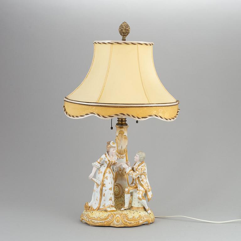 a rococo-style porcelain table lamp from the first half of the 20th century.