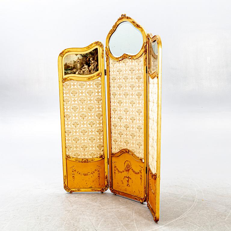 A Louis XV style folding screen around 1900.