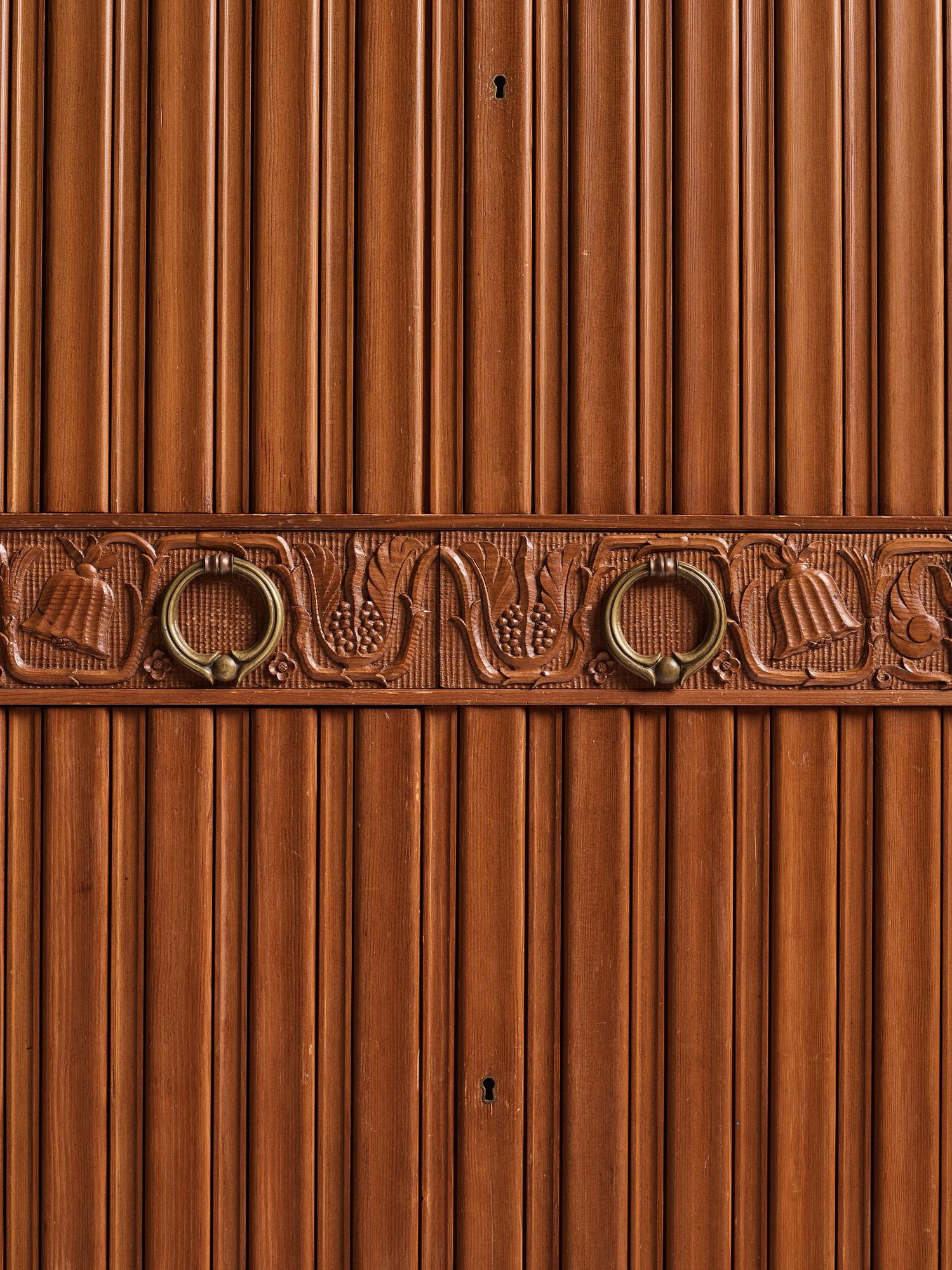 A Swedish Modern stained pine cabinet, 1940s.