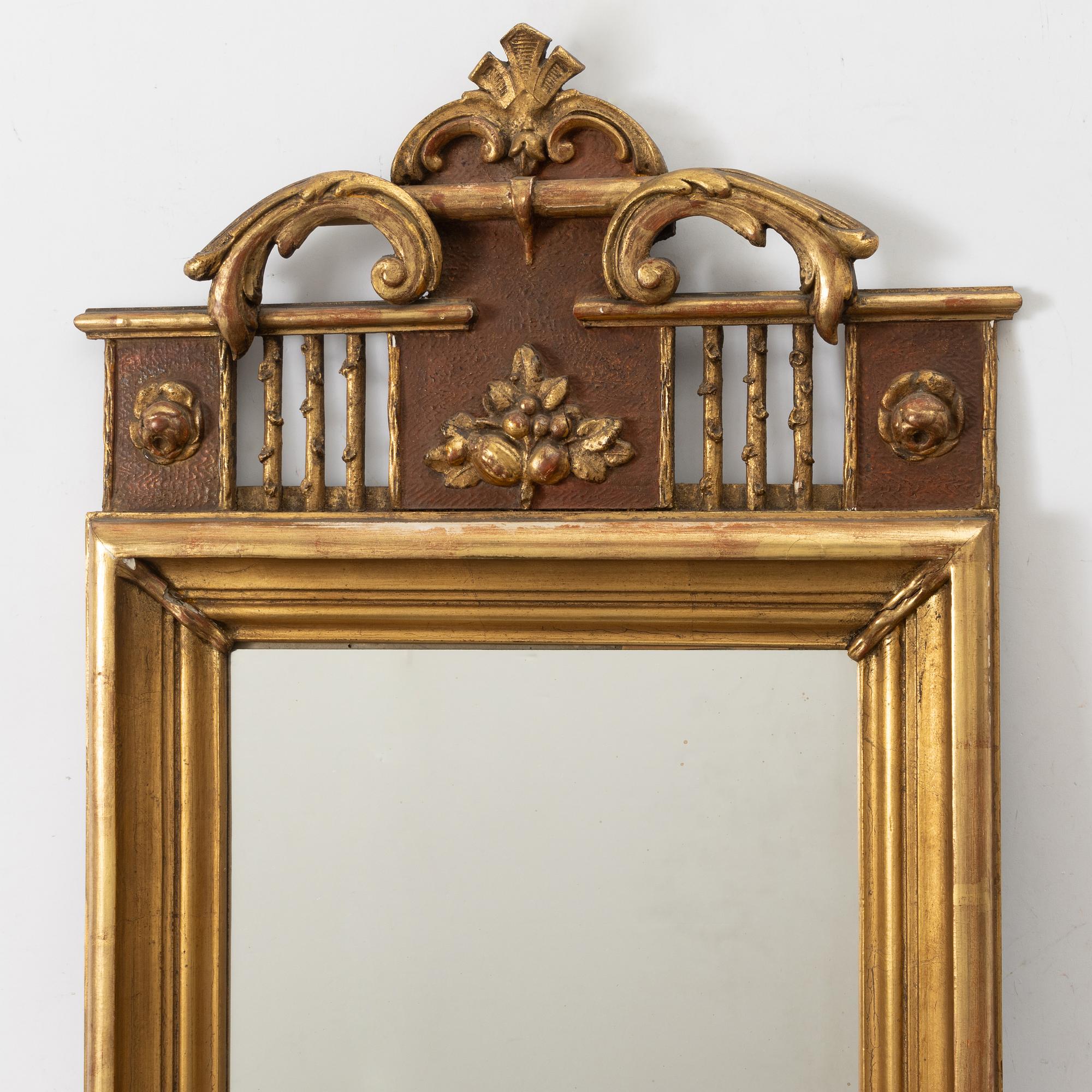 A mirror, Empire, 19th century.